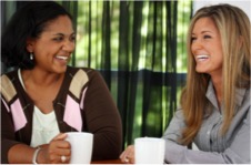 Two friends chatting over coffee
